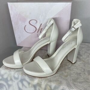 Chic White Heeled Sandals by Shoeland
